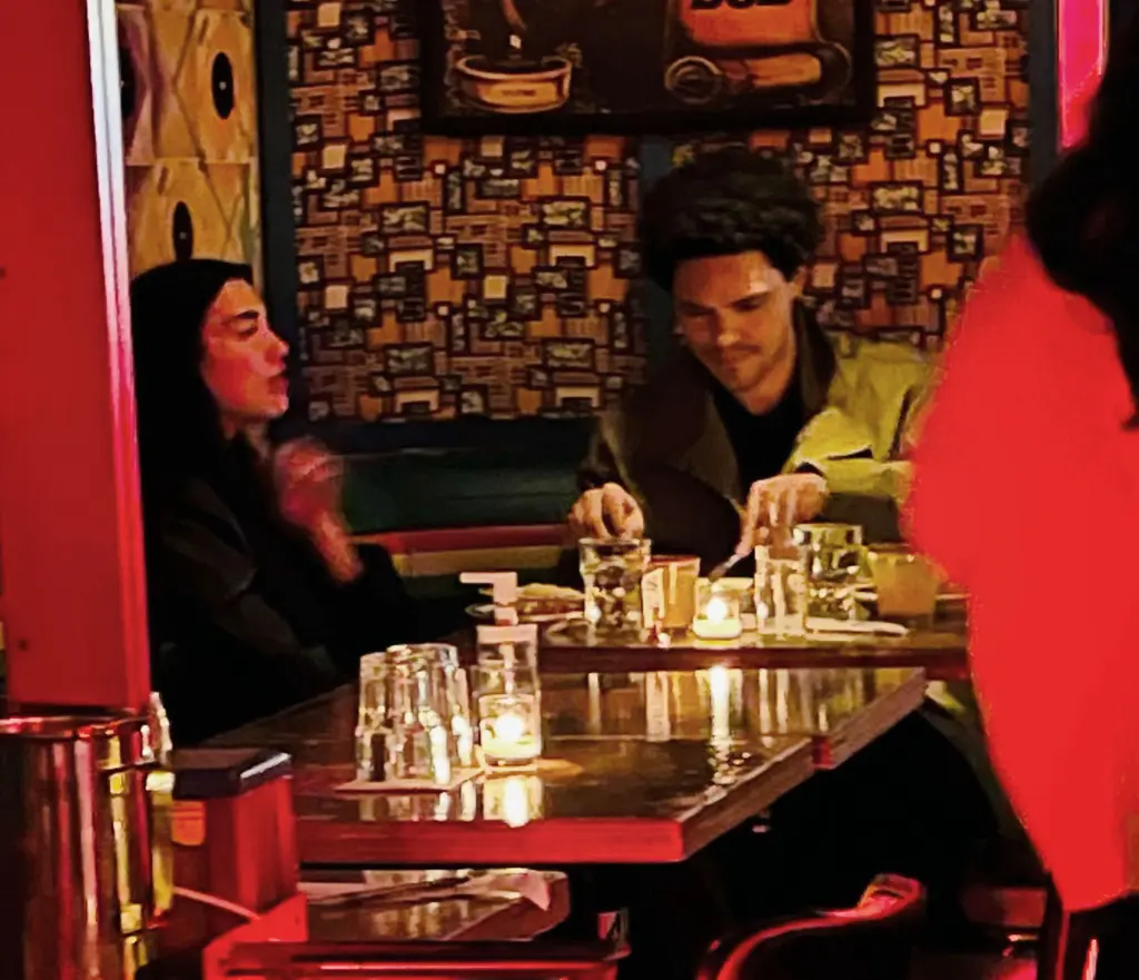 Trevor Noah and Dua Lipa had a "intimate" date night "in their own little world.", According to an eyewitness
