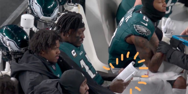 Is an NFL player reading a book on the sidelines a win for books?