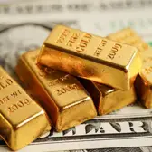As Dollar Plummets, Is Now a Good Time To Invest in Gold?