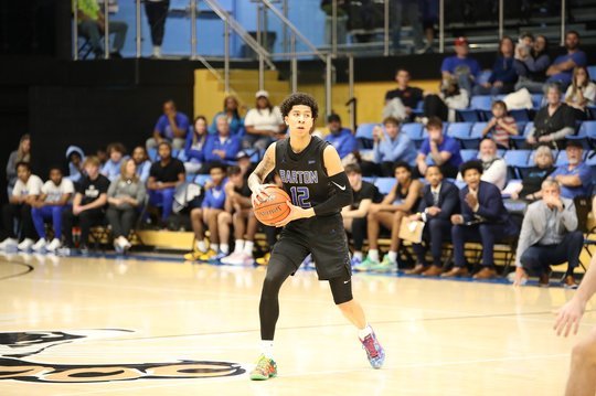 Barton Cougar men win home opener