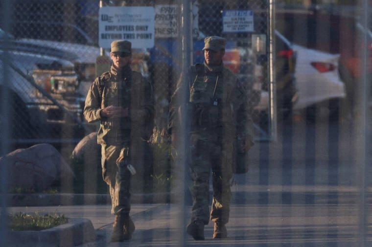 Some National Guard troops withdraw from Chicago and Portland