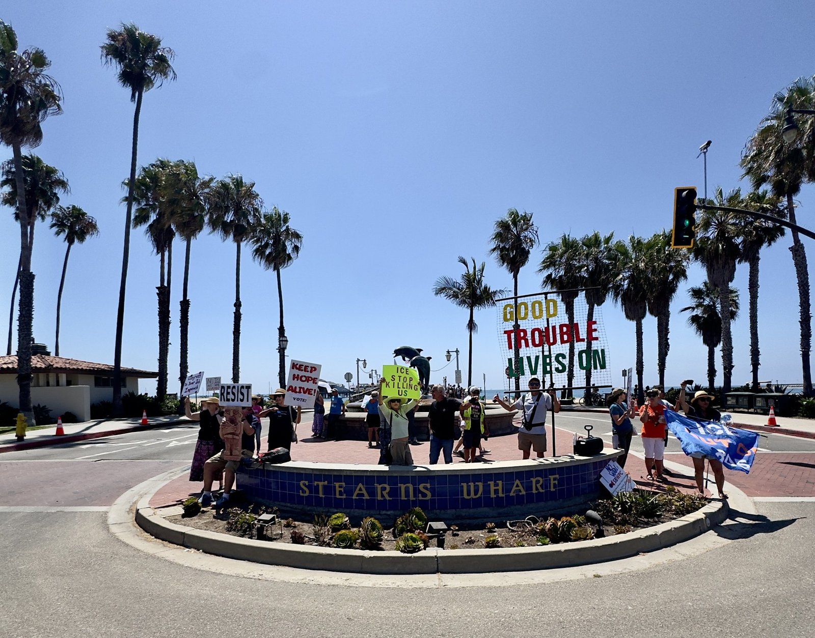 Large crowd gathers for Indivisible SB rally at Dolphin Fountain in Cabrillo Boulevard in Santa Barbara