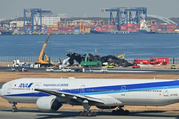 all 367 passengers 12 crew board japan airlines plane escaped down emergency slides jpg