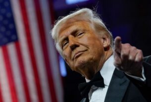 u s president donald trump gestures as he attends the national republican congressional committee nrcc dinner at the national