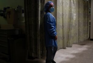 A nurse checks on a patient in the Triage area in a hospital in Royal Oak Michigan U.S. February 1 2022. Reuters File